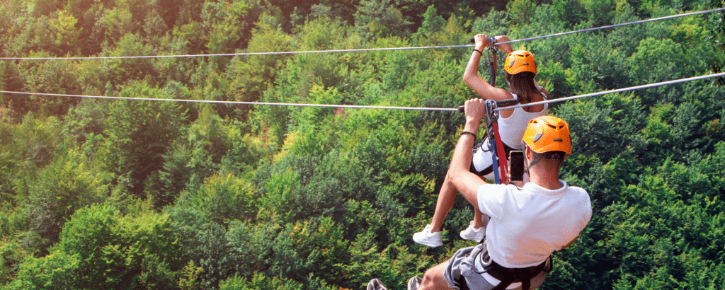 a man and woman ropegliding at gandikota