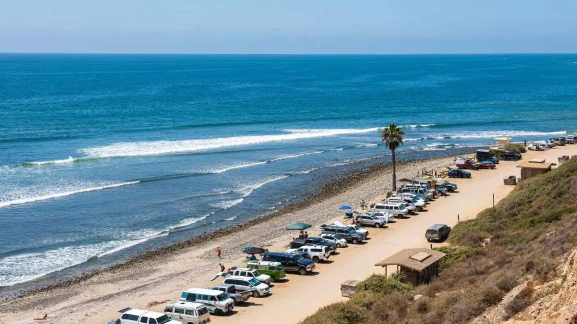 San Onofre State Beach, San Clemente. Cars parked in row near the beach
