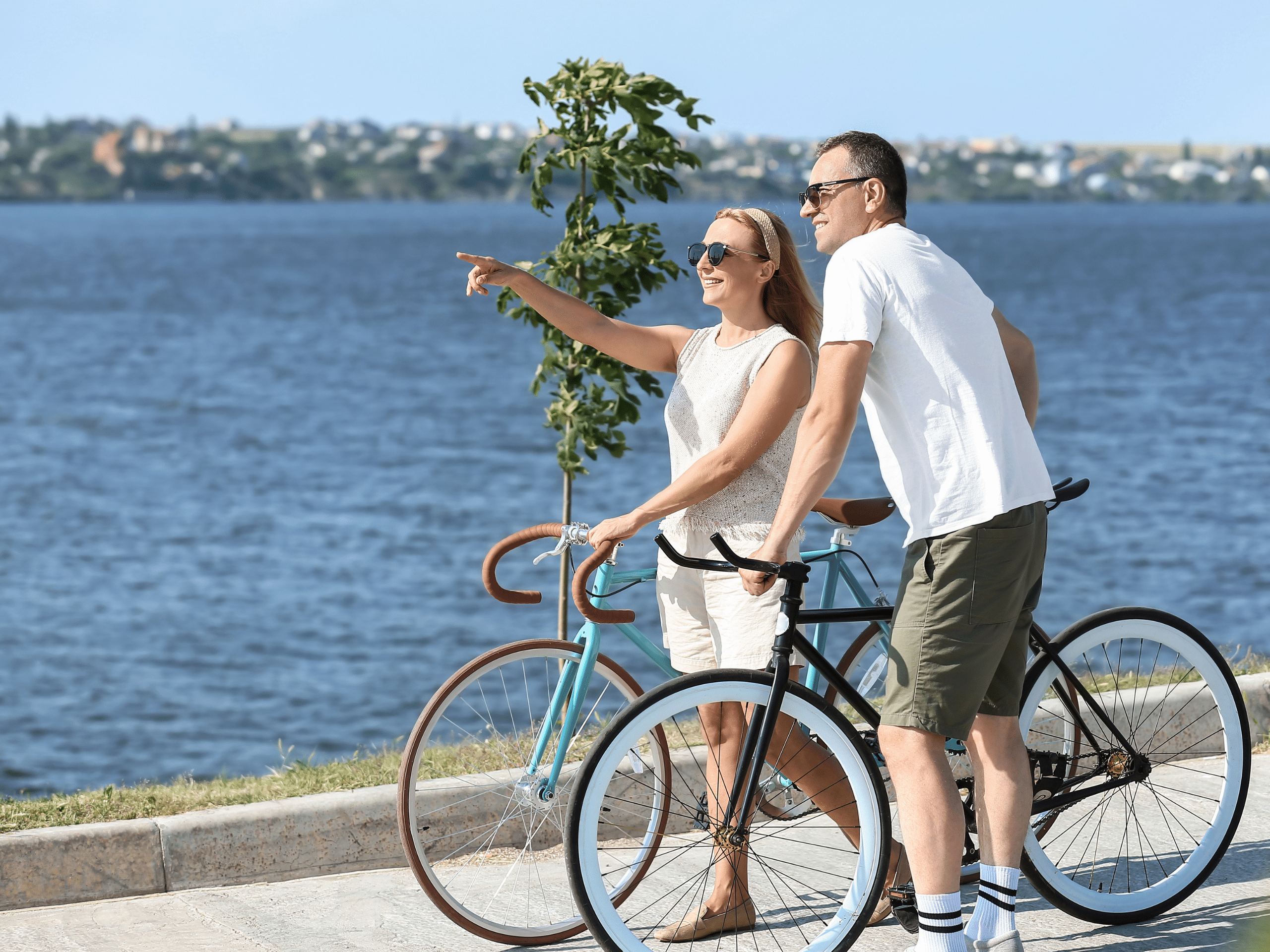 a man and woman enjoying a Bike ride along windsor essex county region