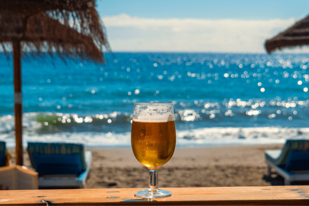 A glass filled with cold Cerveza.