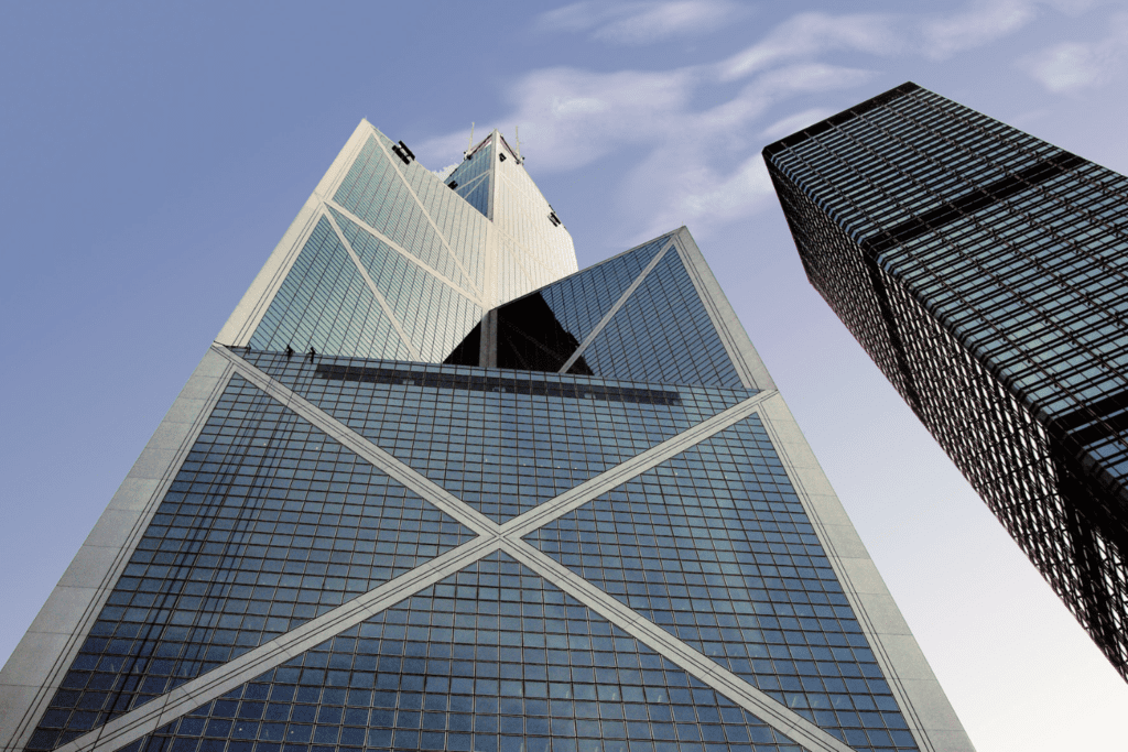 The tall Bank Of China Tower among Hong Kong buildings.